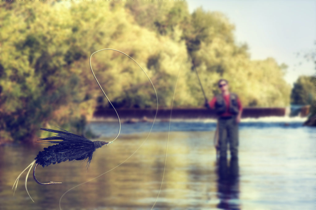 Man casting his rod