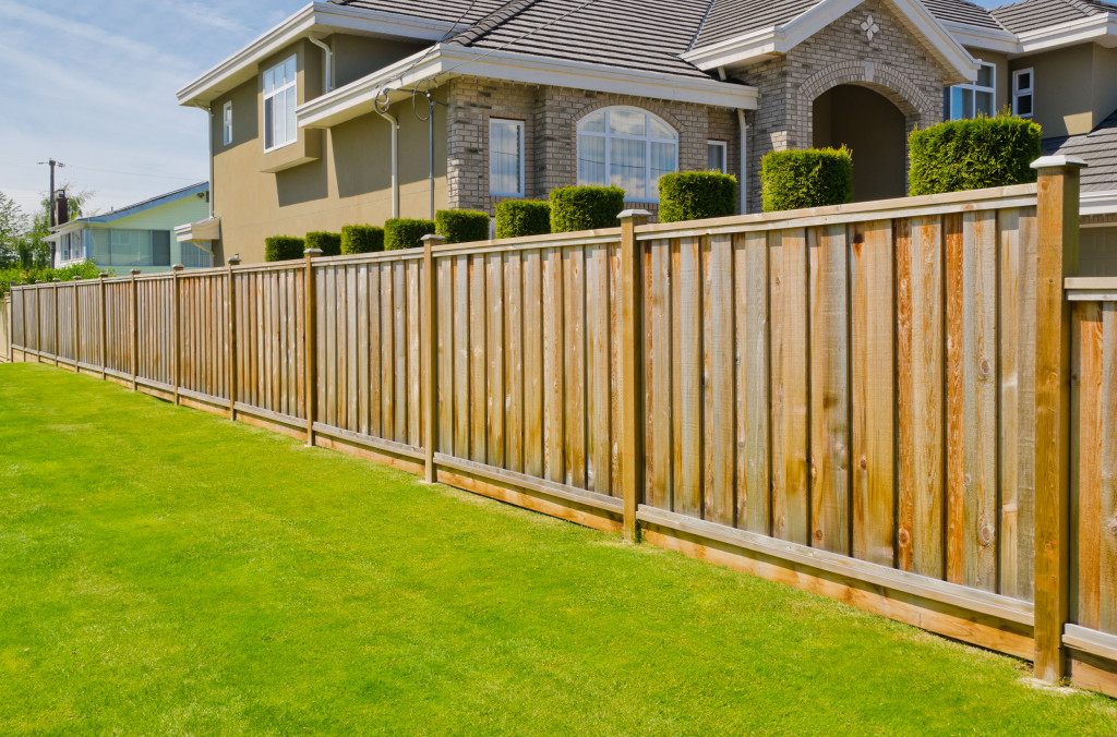 a modern composite fence in wood design