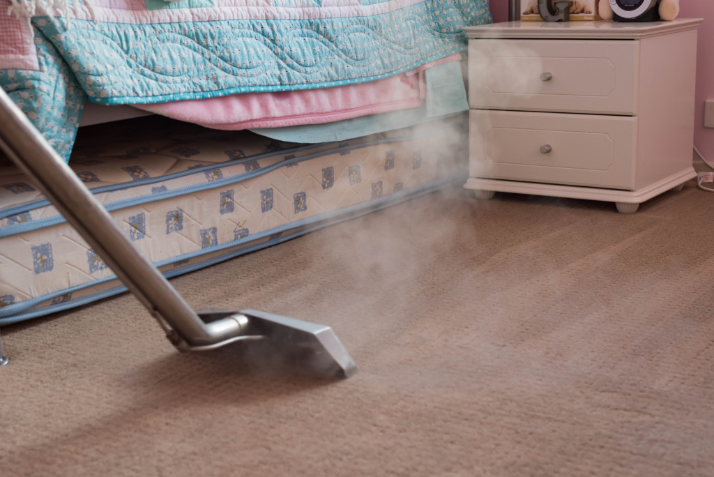 vacuuming bedroom with steam cleaning 