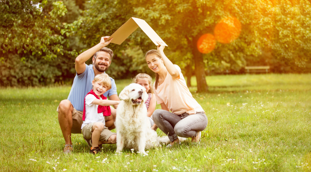 Pet and kids outdoors enjoying themselves